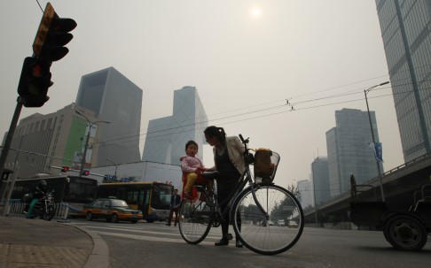 Cars are rapidly replacing bicycles in Beijing's central business district and other parts of the capital. Photo: Simon Song