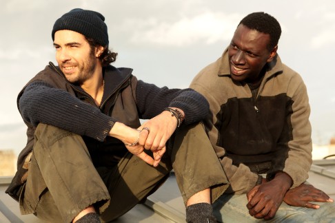Tahir Rahim (left) and Sy in a scene from Samba. Photo: David Koskas/Broad Green Pictures