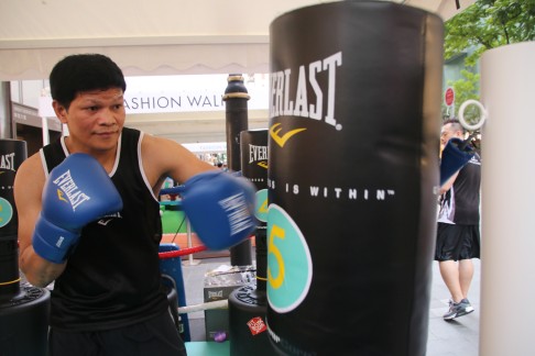 The Filipino ex-boxer works out on the heavy bag.
