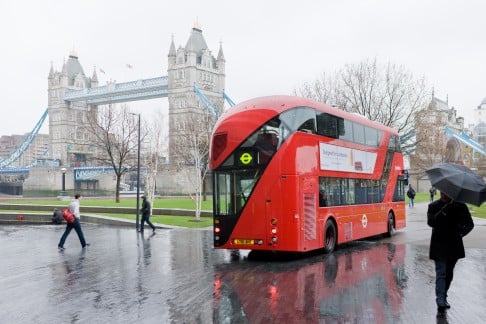 New London Routemaster bus in front of Tower Bridge. Photo: Iwan Baan, 2012