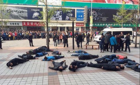 As Chinese taxi drivers across the nation continue to complain of harsher working conditions and the harmful effects on their business of apps like Uber, a group of cabbies attempted mass suicide in Beijing in April during a vehicle-leasing protest. All later recovered in hospital. Photo: Handout