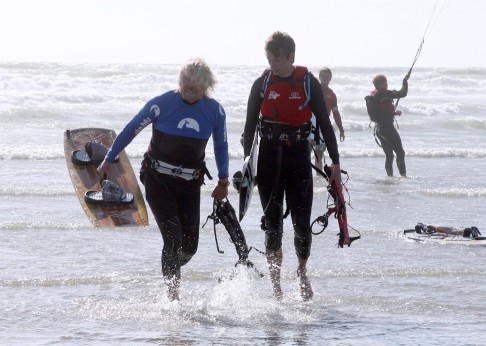 Richard Branson (left) arrives in France after crossing the English Channel by kiteboard in 2012. 