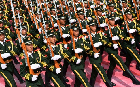 Soldiers take part in a training at a training base in Beijing. Photo: Xinhua