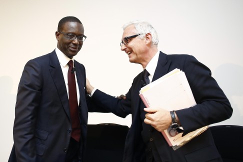 Tidjane Thiam with Urs Rohner, the chairman of Credit Suisse. Photo: Bloomberg
