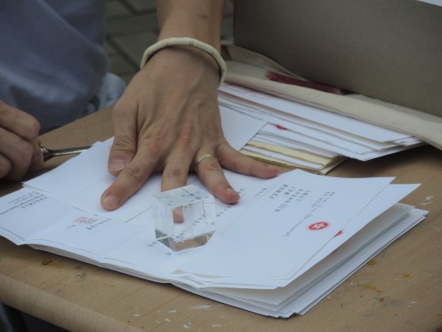 Cheng opened more than 100 letters in his one-man protest.