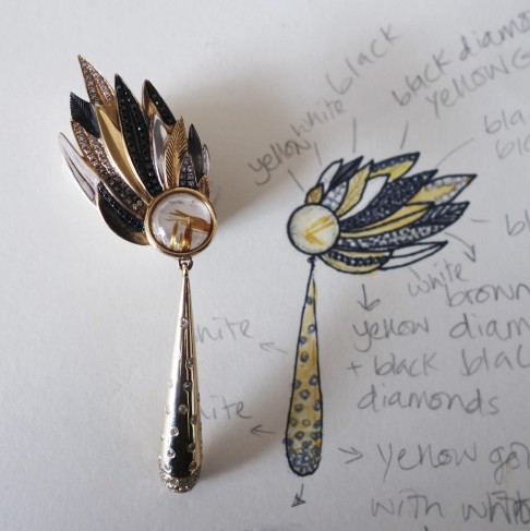One of Hourani's winged earrings and her original sketches.