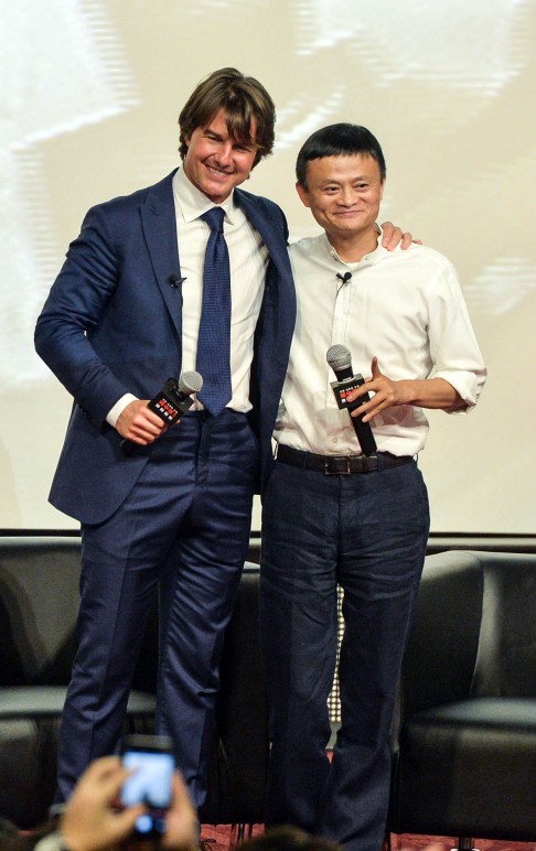 Tom Cruise poses for photos with Alibaba founder and executive chairman Jack Ma at the Shanghai premiere of Cruise's latest film "Mission: Impossible - Rogue Nation" on September 6. Alibaba Pictures invested in the movie and is helping to promote it in China. Photo: AFP