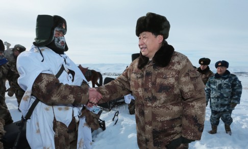 President Xi Jinping, outfitted with the new military uniform, is pictured visiting troops stationed on the China-Mongolia border during a trip to Inner Mongolia last year. Photo: Xinhua
