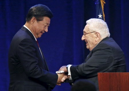 Xi is introduced by former US National Security Adviser and Secretary of State Kissinger in Seattle, Washington. Photo: Reuters