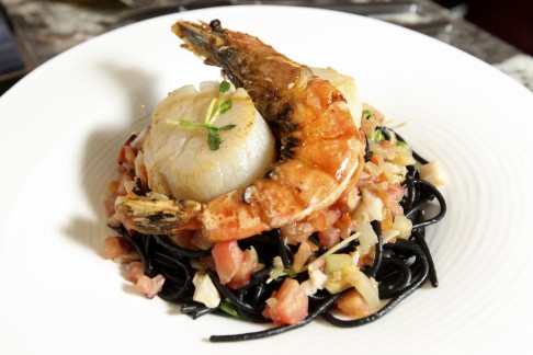 Seafood on squid ink pasta. Photo: Franke Tsang
