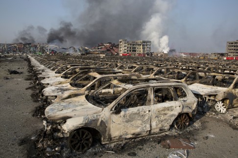 Smoke billows from the site in Tianjin. Photo: AP