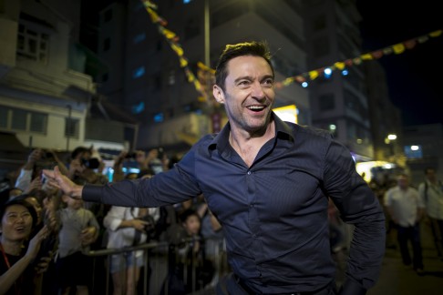 Jackman surprised the crowds in Tai Hang to see the annual Fire Dragon Dance on September 28 by putting in an appearance. He was in Hong Kong promoting "Pan". Photo: Reuters