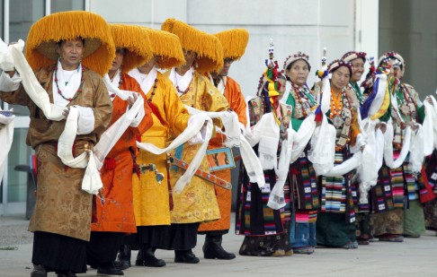 Members of the The Minnesota Tibetan American Association Gyashay group perform a welcome for the Dalai Lama at the Mayo Civic Center in the US on Wednesday following his stay at the Mayo Clinic. Photo: AP