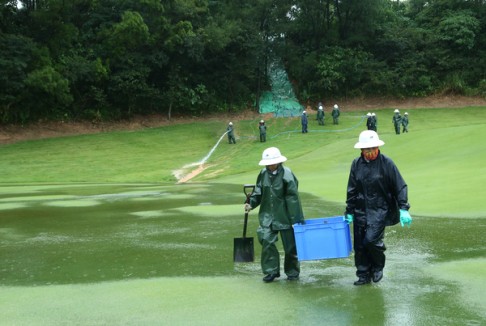 Workers on the course