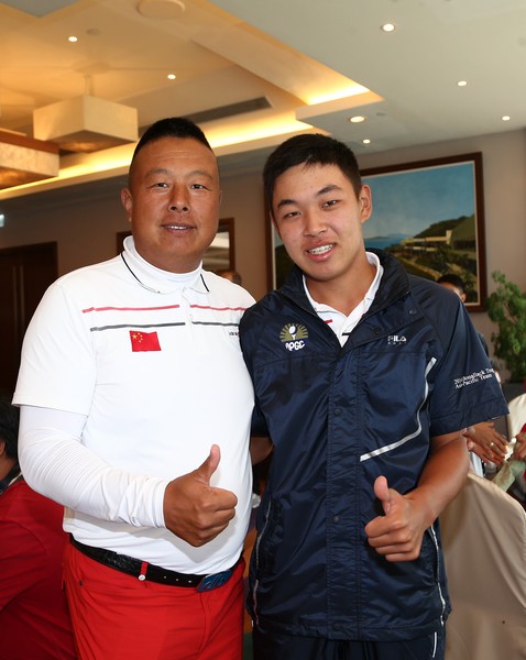 Jin Cheng with China's head coach