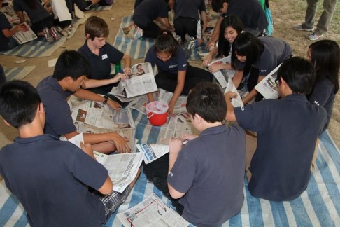 HKIS students take part in a Struggle for Survival simulation. 