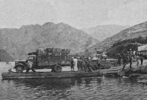 Armed guards escort the exhibits.