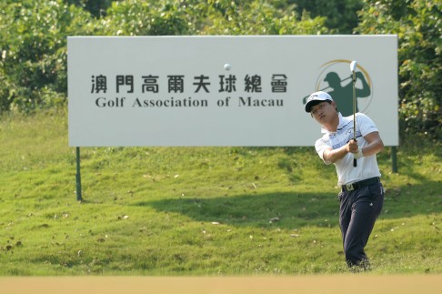 Wang Jeung-hun of South Korea hits a shot during the second round of the Macau Open. Photo: AFP 