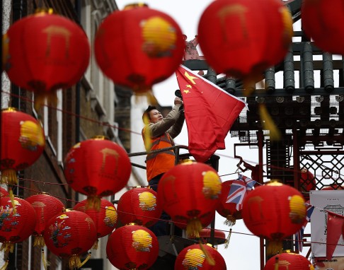 London's Chinatown being spruced up ahead of Xi's visit. Photo: AP