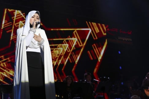 "When I was 17, I realised I can't just sing. I have to perform and know how to communicate with the audience," Shila says. Her father helped her with that.