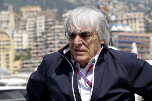 What's the problem with a few embarrassing quotes or situations if you're laughing all the way to the bank, just like Bernie Ecclestone. Photo: EPA