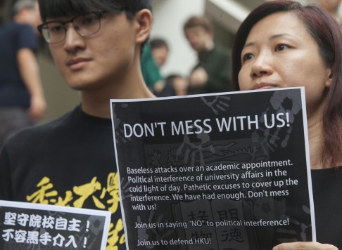 HKU students, including Billy Fung, march to protest what they saw as interference in the university's autonomy. Photo: EPA