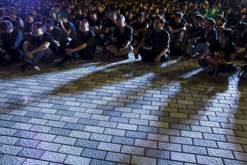 HKU students and staff attend a rally to protest against what they say is outside interference that infringes the university's academic freedom. Photo: Reuters