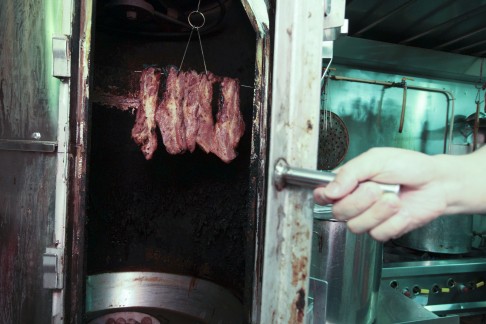 Roasting char siu at Lin Heung Kui. Photo: Bruce Yan