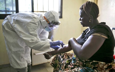 A health worker attends to a patient at the maternity ward in the government hospital in Koidu, eastern Sierra Leone in December 2014. Photo: Reuters