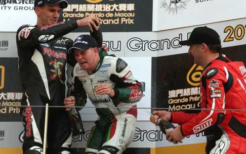 Martin Jessopp (left), Stuart Easton and Michael Rutter celebrate on the podium at the Macau Motorcycle Grand Prix. Photo: K.Y. Cheng