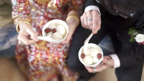 Newlyweds are served tang yuan.