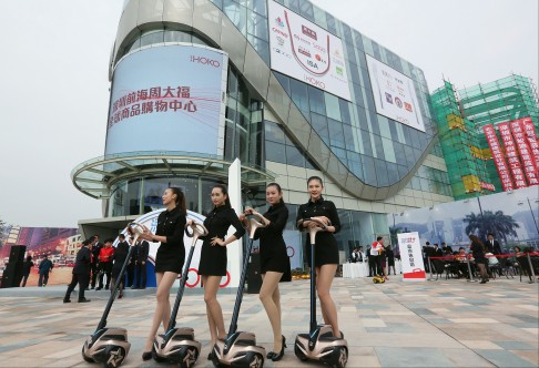 Models attend the soft opening of the CTF HOKO mall in Qianhai on Monday. Photo: Edward Wong