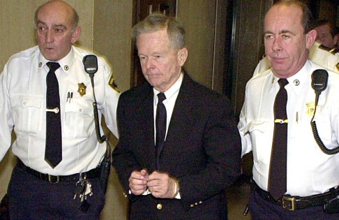 Defrocked priest John Geoghan leaves court in Cambridge, Massachusetts, on February 21 , 2002, after being sentenced to 10 years in jail for sexual abuse.