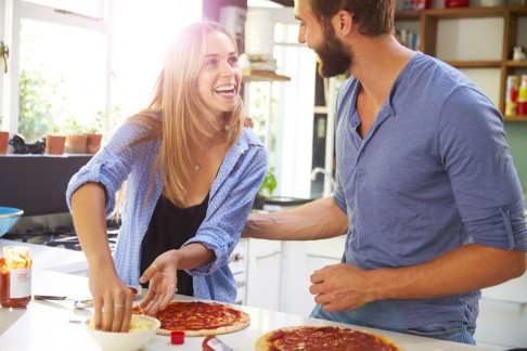 Cooking a meal at home can be a romantic gesture.