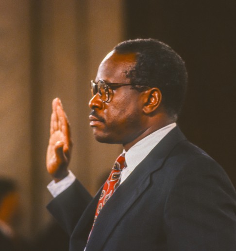 Judge Clarence Thomas swears an oath before giving testimony to the US Senate.