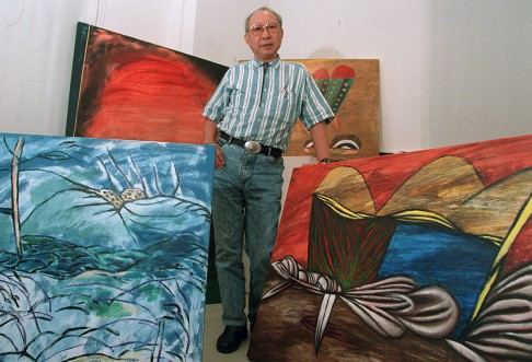 Gaylord Chan with his paintings, in 1995.