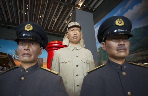 Colonial-era Japanese police mannequins at the history museum.