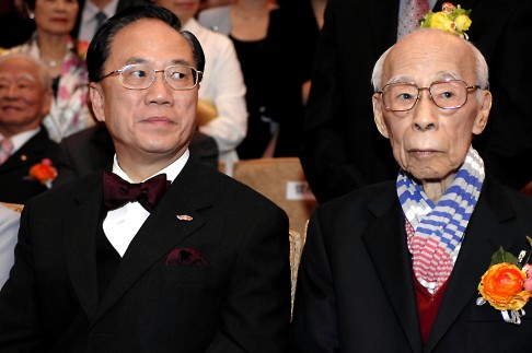 Hong Kong's then chief executive, Donald Tsang Yam-kuen, and Professor Jao Tsung-i, look suitably thrilled at a naming ceremony and cocktail party to celebrate a planet being named after the renowned scholar.