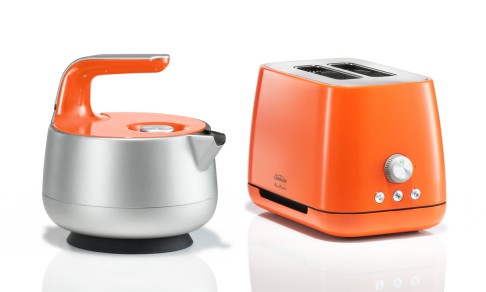 Marc Newson's designs, such as the orange kettle and toaster, are functional and practical.