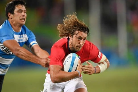 Britain’s Dan Bibby scores the winning try in their men’s rugby sevens quarter-final victory over Argentina. Photo: AFP