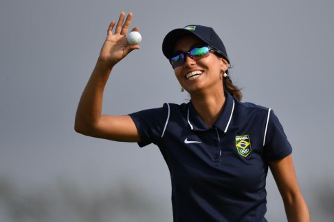 Brazil’s Victoria Lovelady smiles Thursday despite being penalised for slow play.