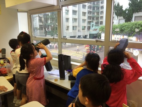 Primary students participate in a variety of scientific activities.