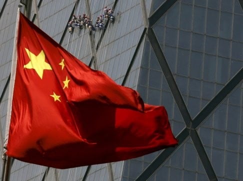 China's central bank cut interest rates on Friday and lowered the amount of cash banks must hold as reserves, besides freeing up deposit rates, after reporting its slowest quarterly economic growth since the global financial crisis. Photo: Reuters