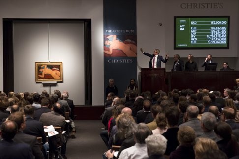 Auctioneer Jussi Pylkkanen auctions Amedeo Modigliani's 'Nu couche'. Photo: Reuters