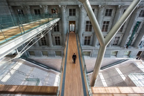 The upper and lower bridges connecting the two main buildings above the atrium at the National Gallery Singapore.