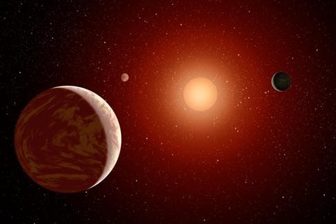 Three planets surround a red dwarf in this file photo. What is significant about the Chinese team’s discovery is that it shows how life can continue in parts of the universe where this was thought impossible. Photo: Wikipedia.