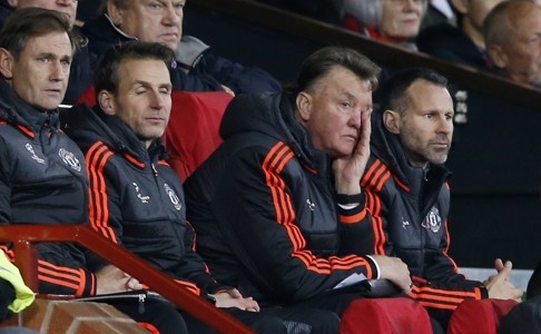 Louis van Gaal tries not to fall asleep while watching United. Photo: Reuters