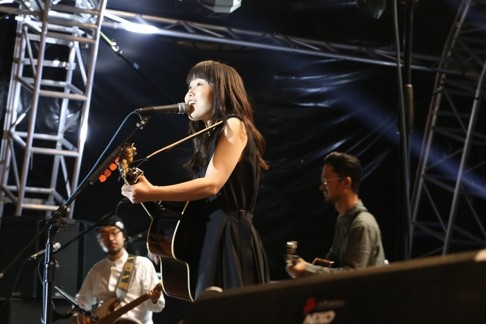 Kumi (that is her full name) singing for ‘delico. Photo: SCMP Pictures