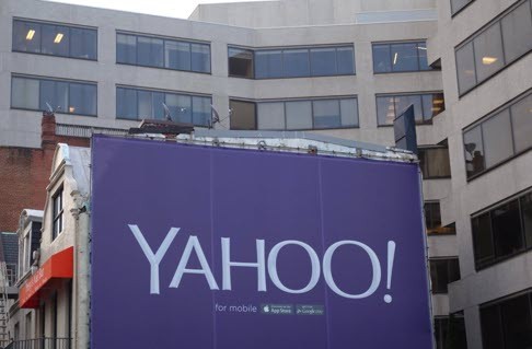 A billboard for the technology company Yahoo in Washington, DC. Yahoo said December 9, 2015, it would seek a “reverse spinoff” that would separate tits core operations from its holdings in China’s online giant Alibaba. Photo: AFP