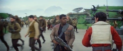 John Boyega (centre) and Poe Dameron in a scene from Star Wars: The Force Awakens.